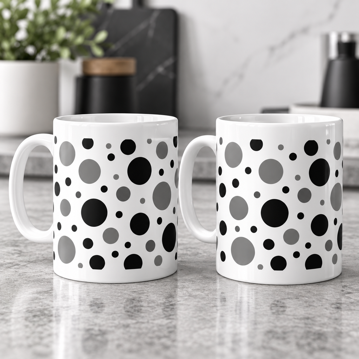 Monochrome Floating Spots Ceramic Mugs – Set of 2 with matching wraparound patterns, white ceramic borders and both handles on the left