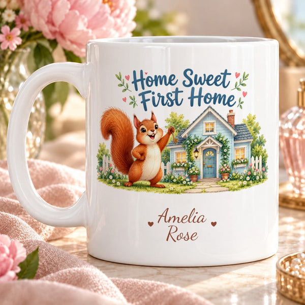 Home Sweet First Home – Personalised Mug — charming cartoon red squirrel proudly outside pastel blue first-home cottage, tiny flowers
