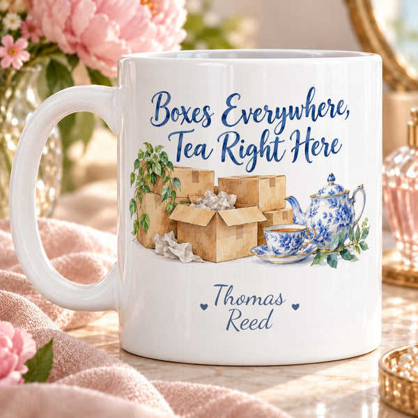 Boxes Everywhere, Tea Right Here – Personalised Mug — delicate hand-painted watercolour moving boxes grouped beside elegant blue teapot and tea cup with leafy sprig