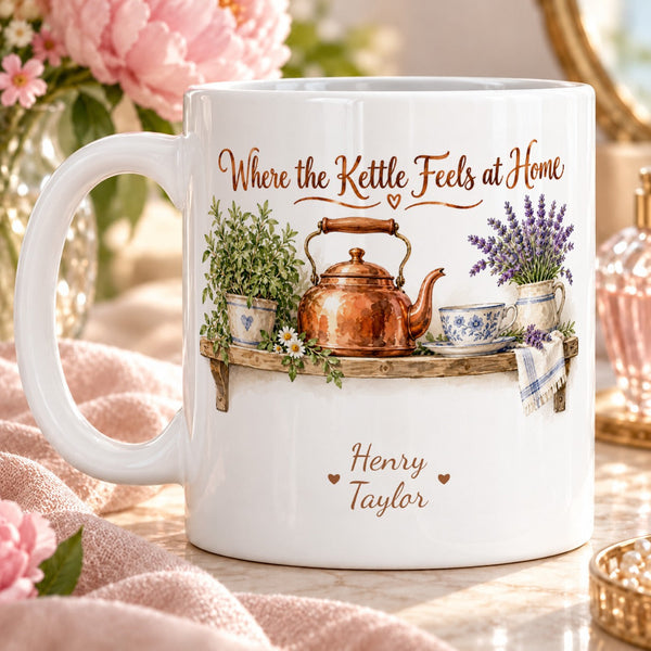 Where the Kettle Feels at Home – Personalised Mug — warm detailed watercolour copper kettle on cottage kitchen shelf, teacup, herb plant and lavender