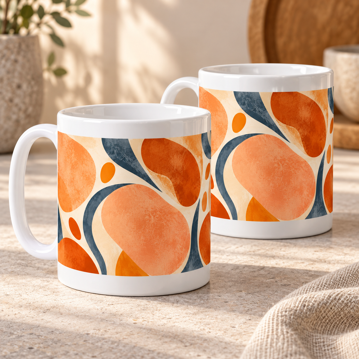 Apricot Shapes abstract ceramic mugs, matching set of two, full wraparound design