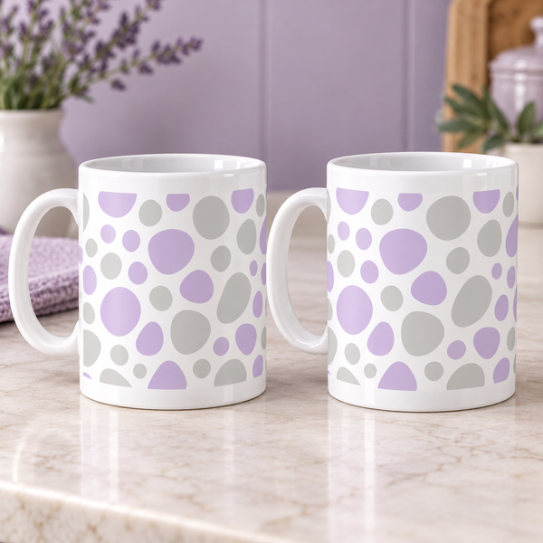 Lilac Pebble Spots Ceramic Mugs – Set of 2 with matching wraparound patterns, white ceramic borders and both handles on the left