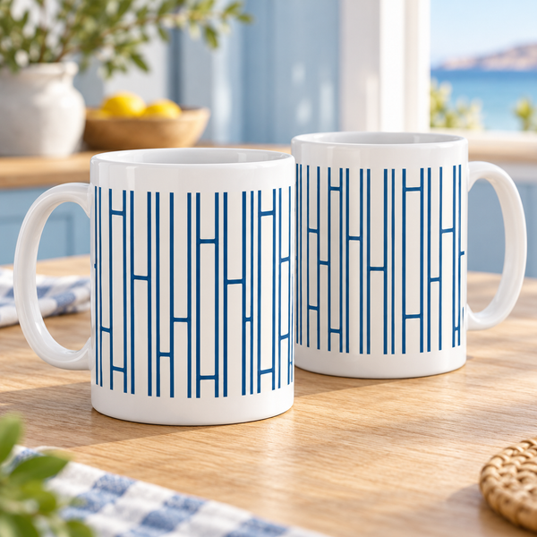 Two white ceramic mugs with ocean-blue ladder stripes and white borders